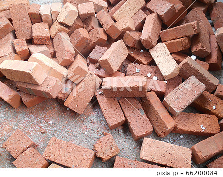 Pile of red clay brick at the construction site. Pile of red clay brick at the construction site. 66200084