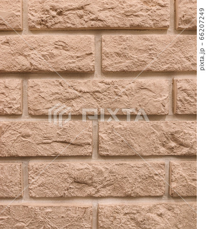 background of the wall is a brown brick surface. Abstract wall background 66207249