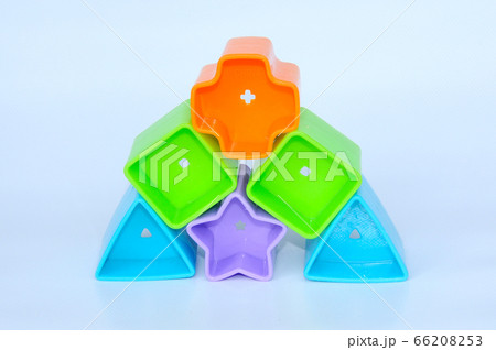 Isolated children's toy blocks in various shapes made of plastic on white background Isolated children's toy blocks in various shapes made of plastic on white background 66208253