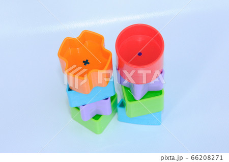 Isolated children's toy blocks in various shapes made of plastic on white background Isolated children's toy blocks in various shapes made of plastic on white background 66208271