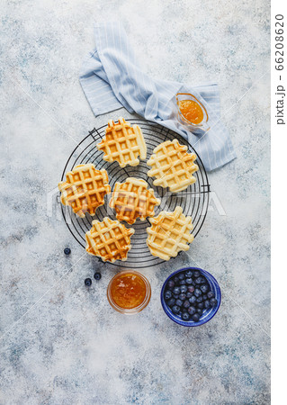 Home made Belgian waffles served with berries 66208620