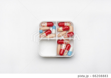tablets and capsules in a box, pharmaceutical medicine, concept medicine tablets and capsules in a box, pharmaceutical medicine, concept medicine 66208883