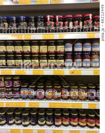 SEREMBAN, MALAYSIA -MARCH 15, 2020: A variety of fruit jams are on display at a supermarket. Separated by type to facilitate customers. SEREMBAN, MALAYSIA -MARCH 15, 2020: A variety of fruit jams are on display at a supermarket. Separated by type to facilitate customers. 66212449