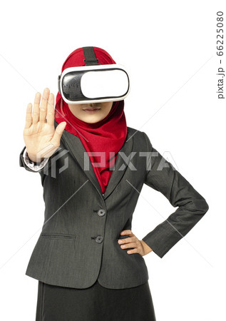 amazed young women wearing virtual reality goggle amazed young women wearing virtual reality goggle 66225080