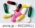 Assorted pills multicolored isolated. 66226911