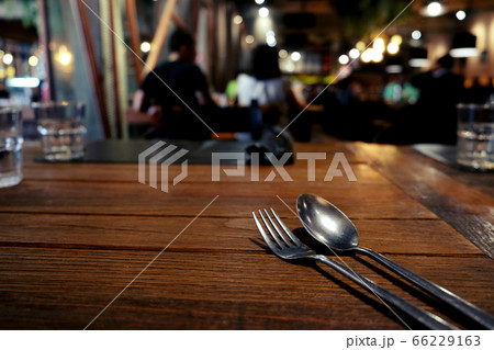 Vintage silverware spoon and fork on rustic wooden Vintage silverware spoon and fork on rustic wooden 66229163