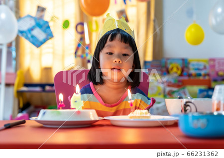 Girl with birthday cake Girl with birthday cake 66231362