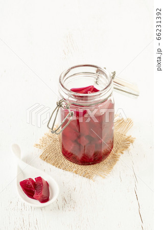 homemade pickled beetroots in jar on wooden table 66231392
