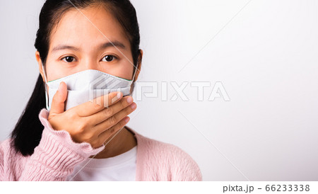 woman wearing surgical protection cloth face mask woman wearing surgical protection cloth face mask 66233338