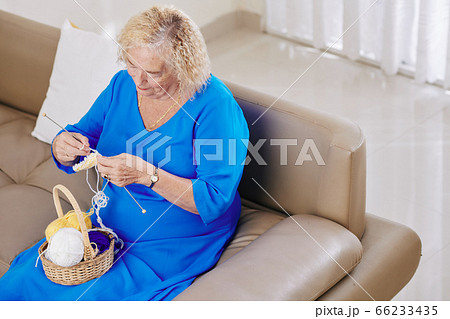 Knitting senior woman Knitting senior woman 66233435