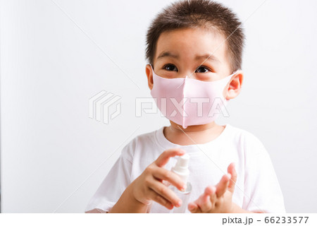little child boy holding show bottle pump little child boy holding show bottle pump 66233577