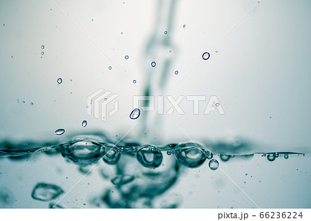 Background of pure water is pouring with bubbles. 66236224