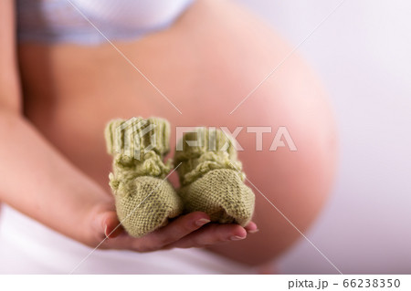 The belly of a pregnant woman, she is waiting for The belly of a pregnant woman, she is waiting for 66238350