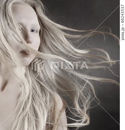 Conceptual art portrait of a young blonde girl 66243537