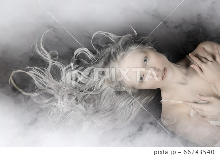 Conceptual art portrait of a young blonde girl Conceptual art portrait of a young blonde girl 66243540