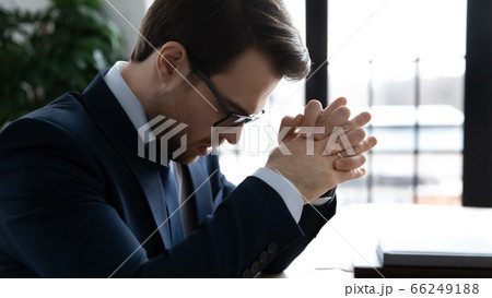 Distressed businessman frustrated with company business failure Distressed businessman frustrated with company business failure 66249188