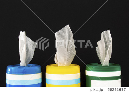 A close up of disinfecting wipes on a black A close up of disinfecting wipes on a black 66251657