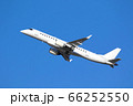 青空の中を離陸する国産旅客機 66252550