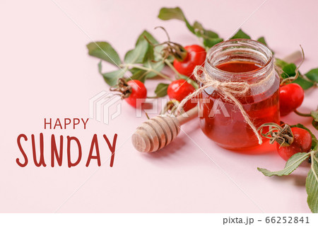 Happy sunday. Fresh rose hip berries and honey on 66252841