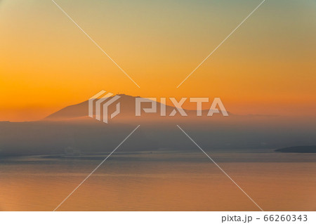 Evening Fog Over a Mountainous Shore Evening Fog Over a Mountainous Shore 66260343