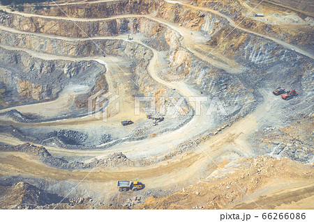 Mining from above. Industrial terraces on open pit 66266086