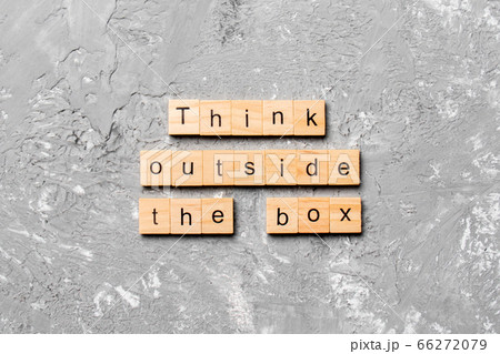 Think outside the box word written on wood block. 66272079