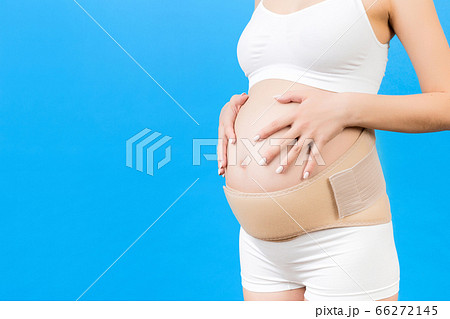 Cropped image of pregnant woman in underwear Cropped image of pregnant woman in underwear 66272145
