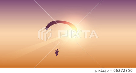 paragliding at sunset in the sky paragliding at sunset in the sky 66272350