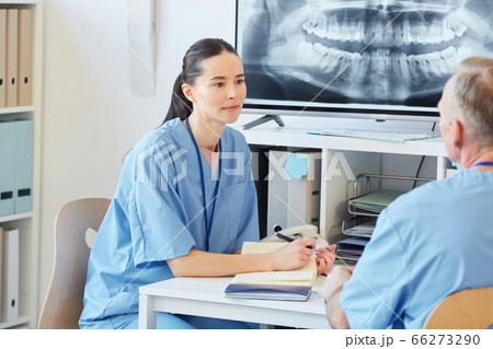 Two Medics Talking in Clinic 66273290