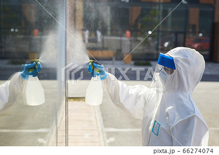 Worker Cleaning Glass Windows Outdoors Worker Cleaning Glass Windows Outdoors 66274074