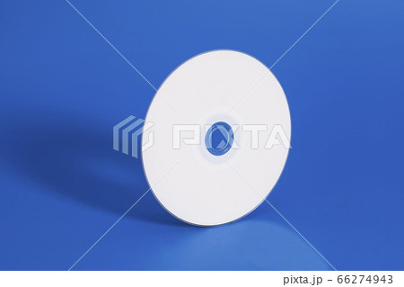 Compact disk on blue background 66274943