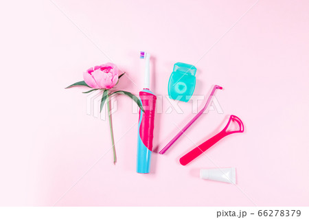 Ultrasonic pink toothbrush, dental floss and 66278379