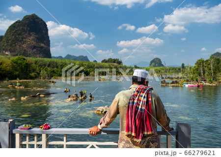 Muslim man visit Klong Rood, Krabi Muslim man visit Klong Rood, Krabi 66279621