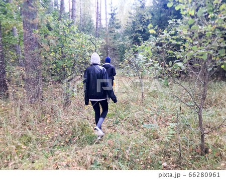 People, mushroom pickers in warm clothes People, mushroom pickers in warm clothes 66280961