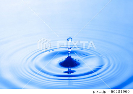 Water droplet falling impact with water surface. Water droplet falling impact with water surface. 66281960