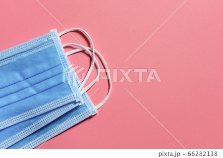 Medical mask on pink background Covid 19 Medical mask on pink background Covid 19 66282118