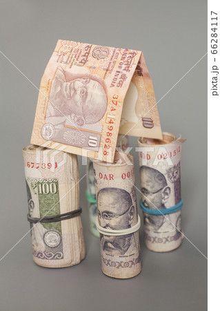 House Made Roll of Indian rupee banknotes isolated 66284117