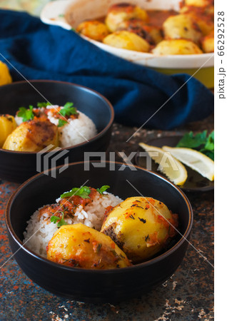Baked potato stuffed with mince meat and rice with Baked potato stuffed with mince meat and rice with 66292528