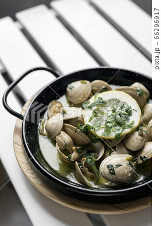 sauteed clams tapas in lemon garlic parsley sauce sauteed clams tapas in lemon garlic parsley sauce 66296917