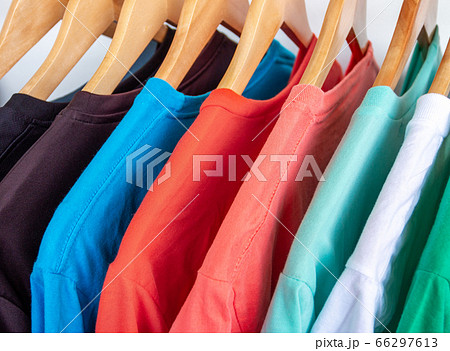 Fashion T-shirt on clothing rack - Closeup of 66297613