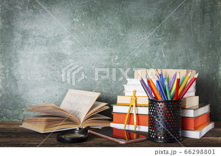 School books on desk, education concept. books on the table in the audience, close up School books on desk, education concept. books on the table in the audience, close up 66298801