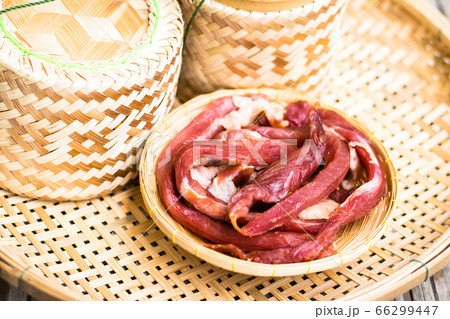 Dried meat in a bamboo dish with Kratib glutinous Dried meat in a bamboo dish with Kratib glutinous 66299447