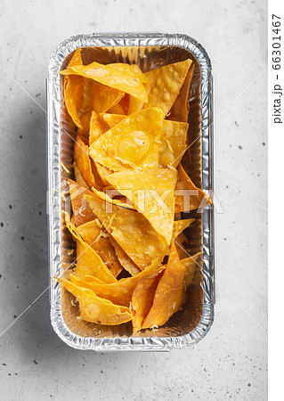A box of delicious plain nacho tortilla corn chips 66301467