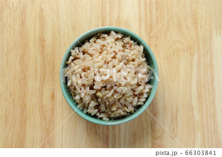 Brown Rice on Wooden Table Brown Rice on Wooden Table 66303841