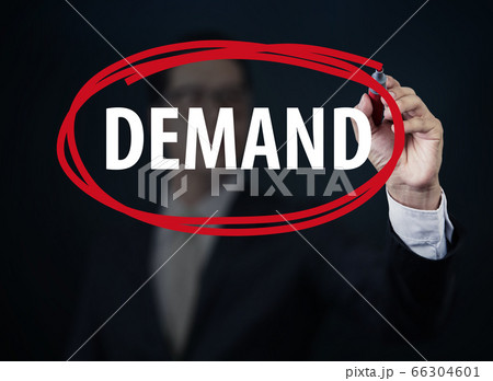 Businessman hand writing "DEMAND" with red marker Businessman hand writing "DEMAND" with red marker 66304601