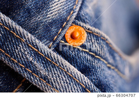 Blue jeans and orange fittings. Blue jeans and orange fittings. 66304707