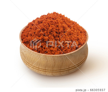 Red paprika powder in wooden bowl isolated on white background 66305937