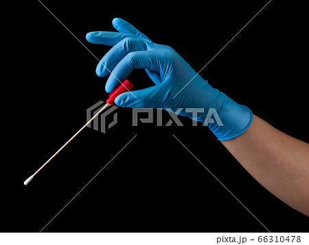 Doctor's hand in medical gloves holding test tube with coronavirus COVID-19 Doctor's hand in medical gloves holding test tube with coronavirus COVID-19 66310478
