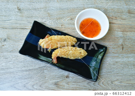 crispy fried shrimp coating flake bread and flour dipping with sweet chili sauce 66312412