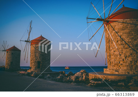 Windmills in the port of Rhodes, Greece 66313869